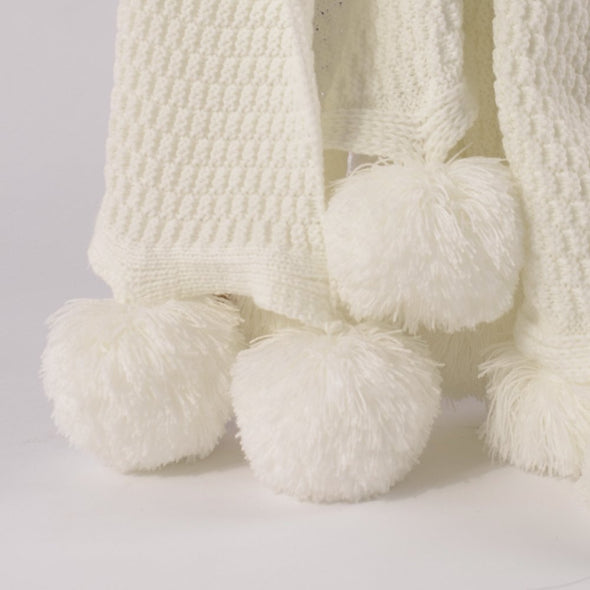 White pompon knitting blanket