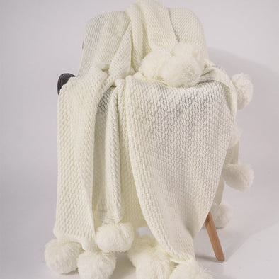 White pompon knitting blanket