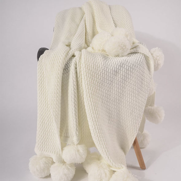 White pompon knitting blanket